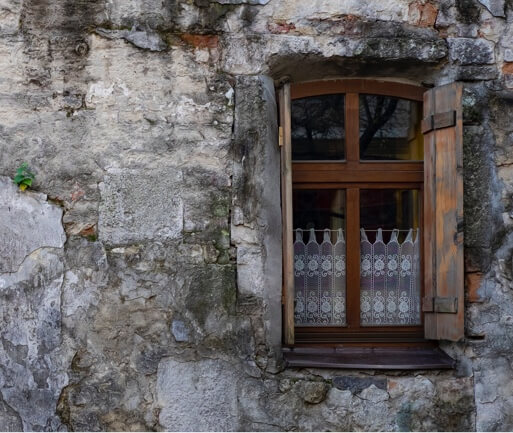 an old open window on an old building